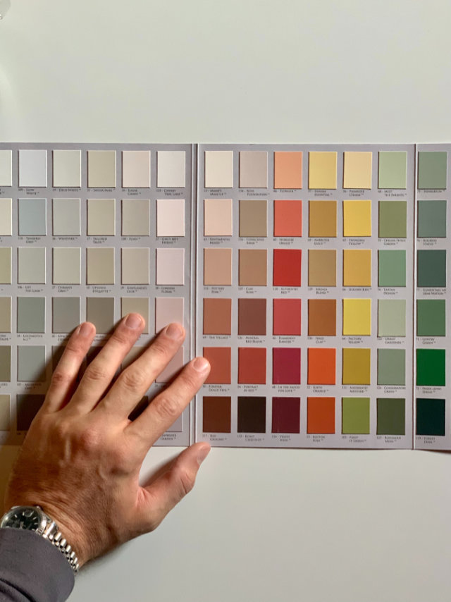 Image of a hand over a paint sample